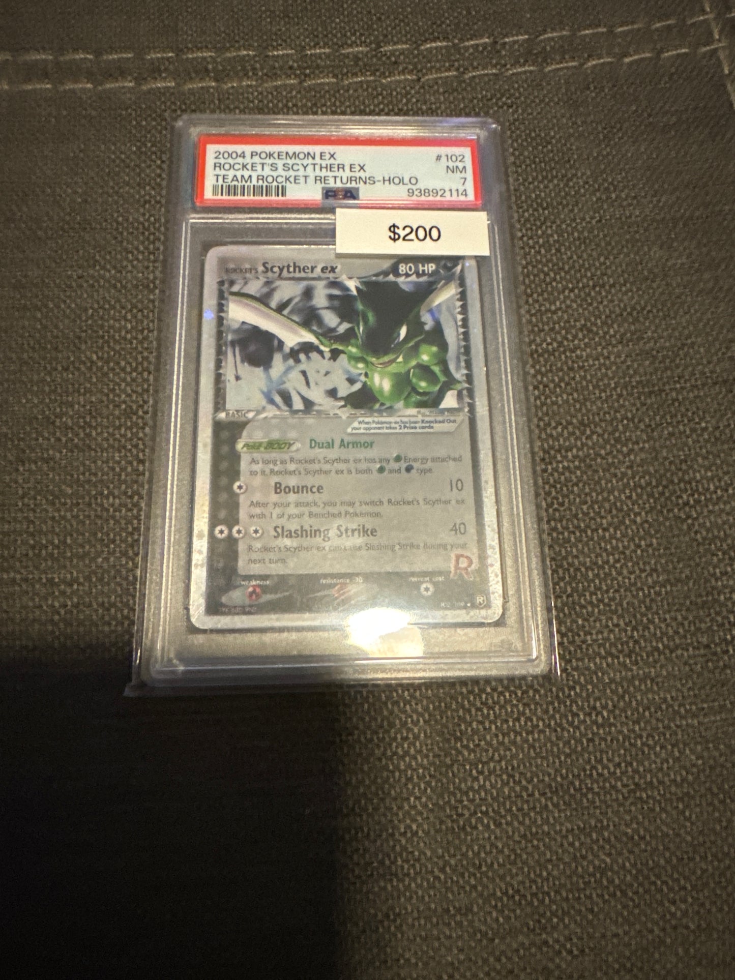 Pokemon Rocket’s Scyther ex PSA 7